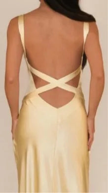 Yellow satin gown, cross-back view